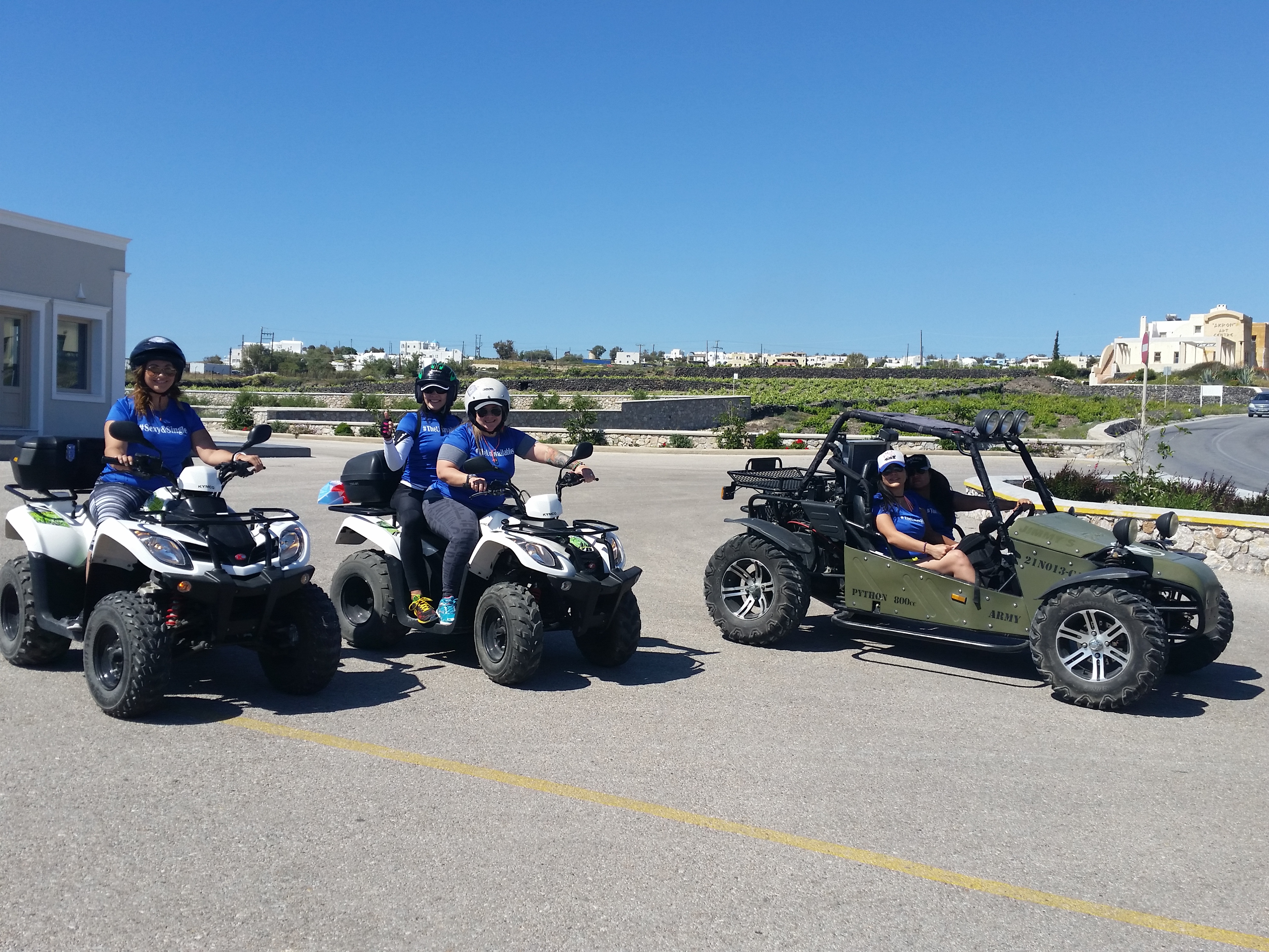 Group of friends with ATVs and buggies in Santorini